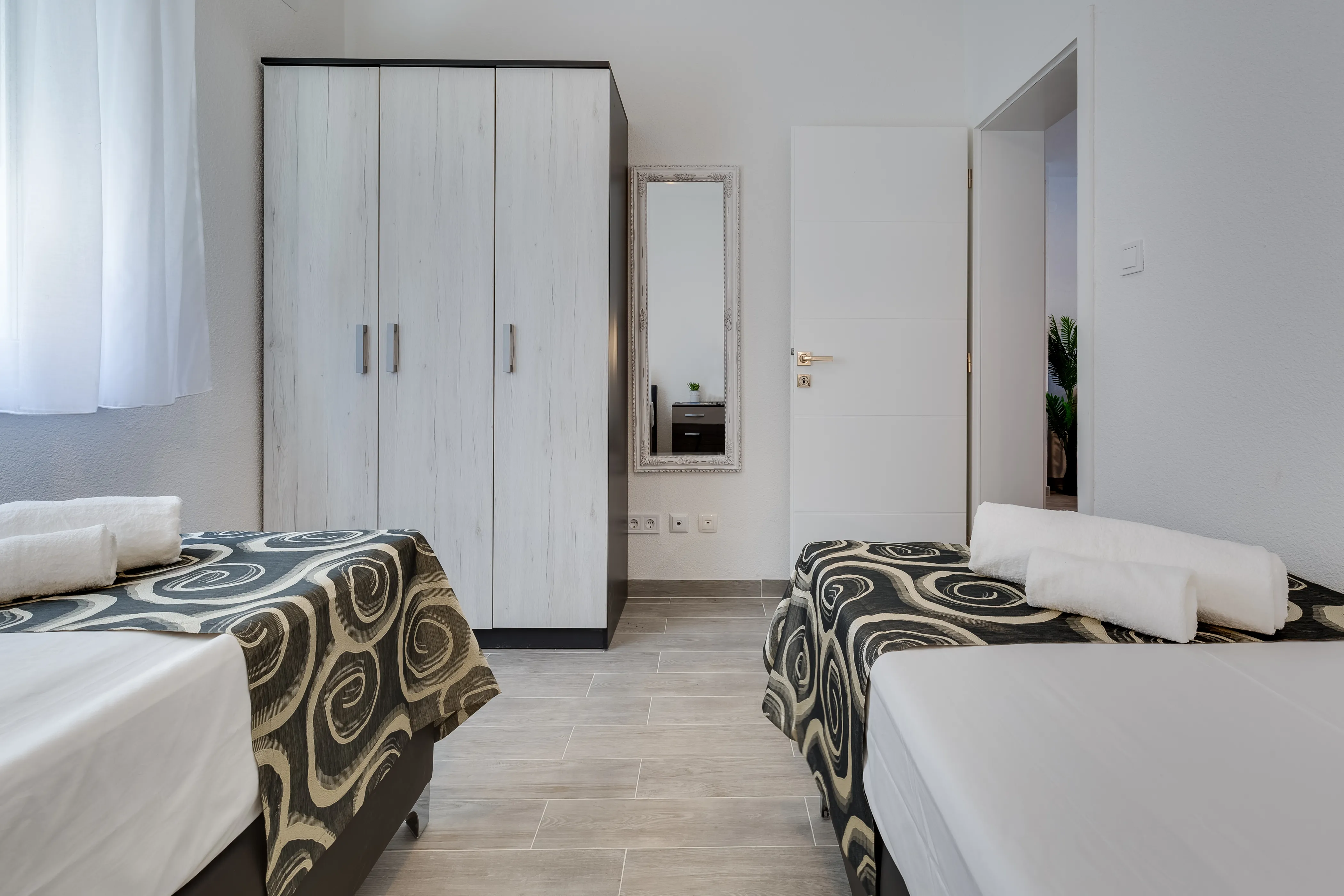 Twin bedroom of the sea view apartment