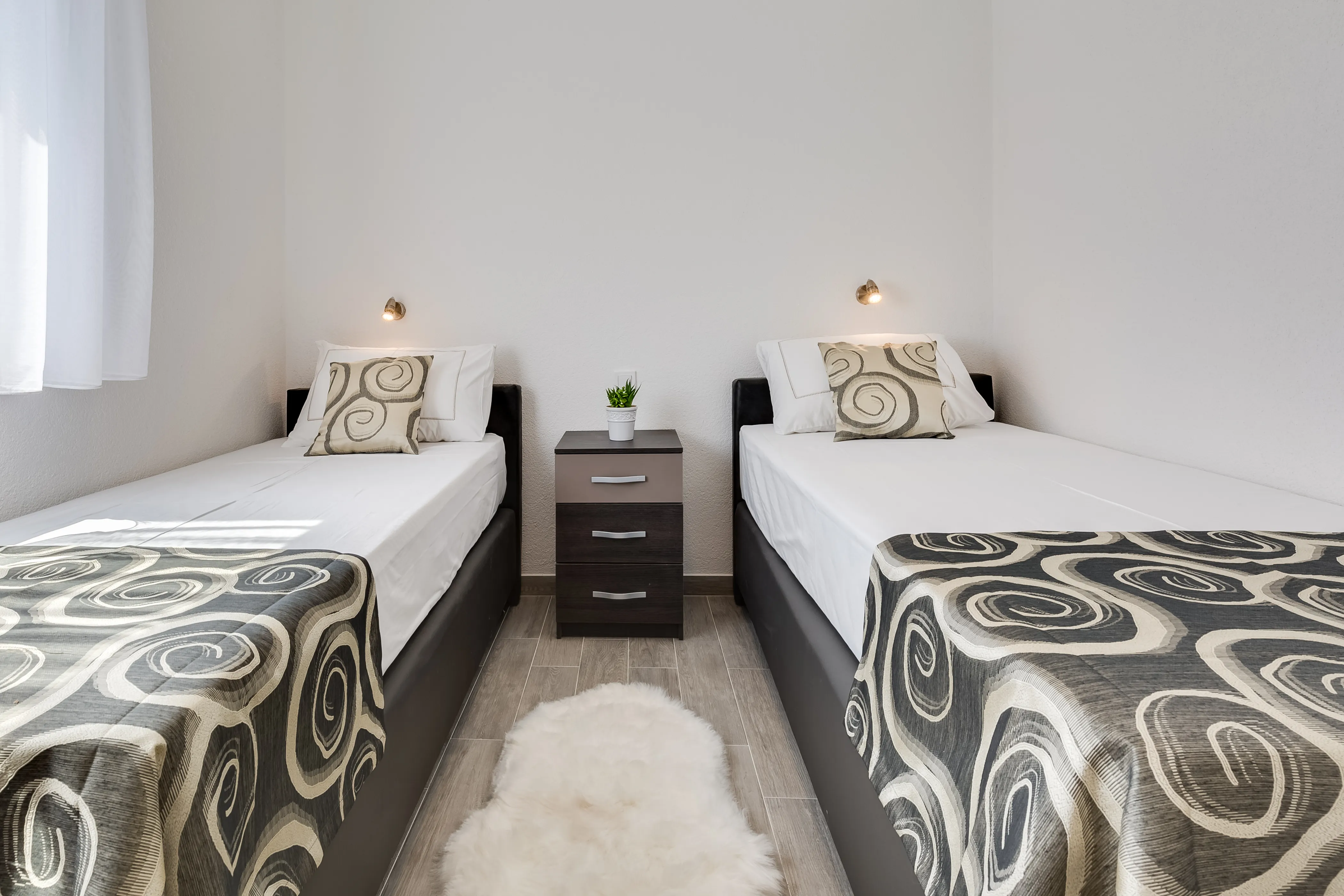 First twin bedroom of the three bedroom apartment