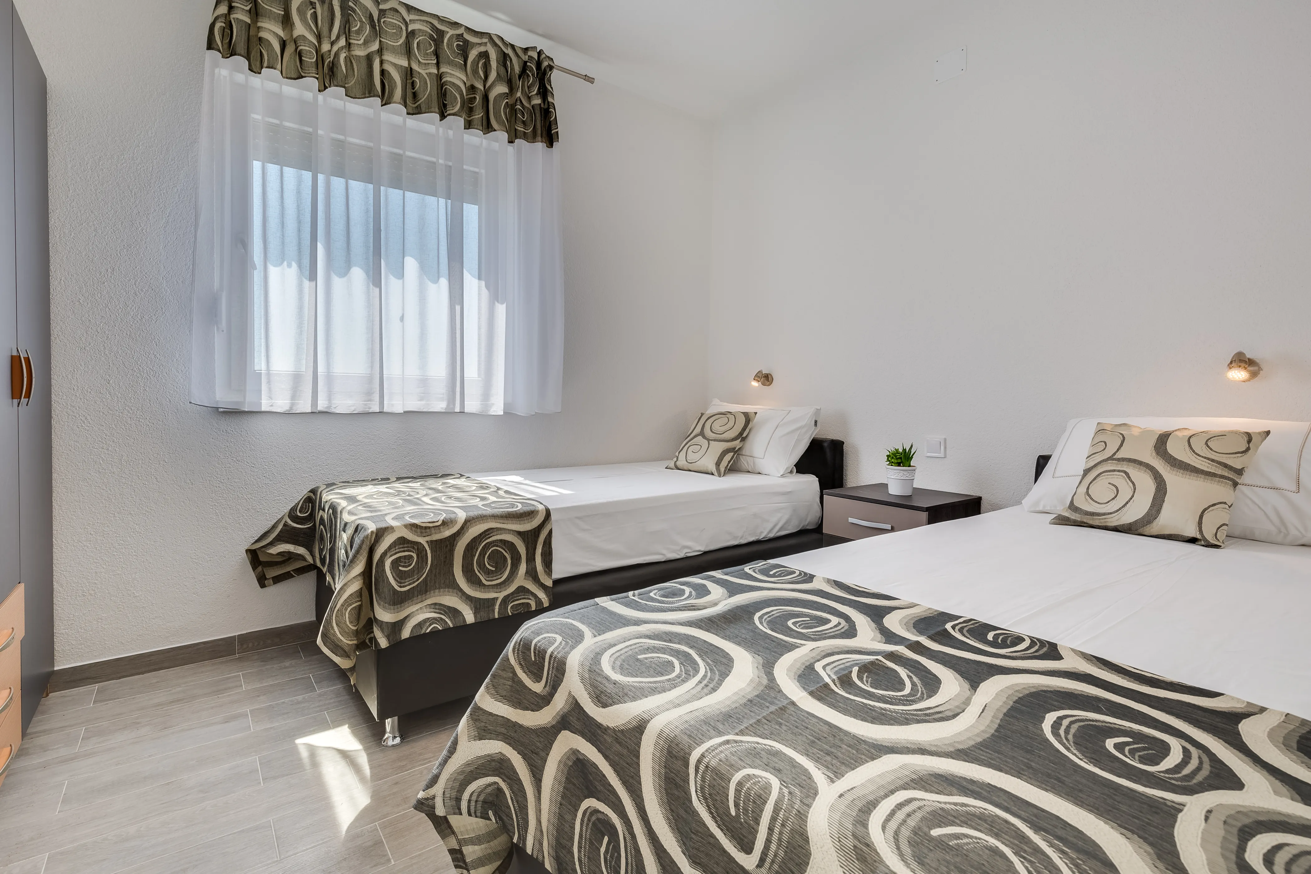 First twin bedroom of the three bedroom apartment